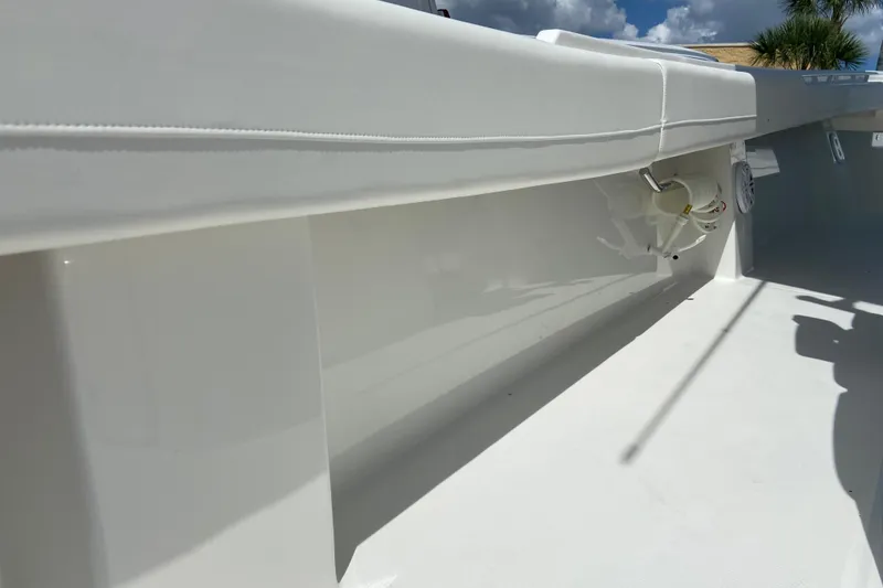 Slide: The Image of 2026 Regulator 31 boat interior, showcasing sleek white design and modern features. - 18