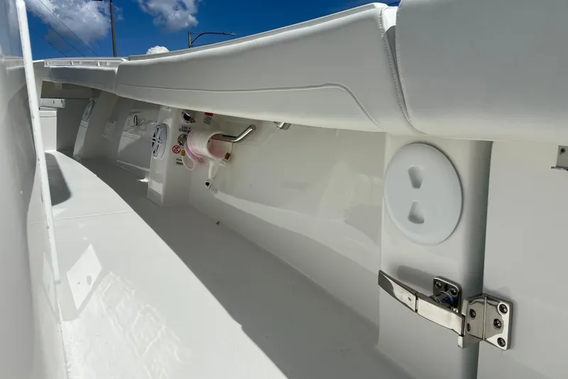 Slide: The Image of Interior view of a 2026 Regulator 31 boat, showcasing sleek white design and fixtures. - 19