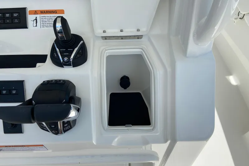 Slide: The Image of Control panel of 2026 Regulator 31 boat with joystick and throttle. - 29
