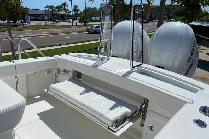 Slide: The Image of 2026 Regulator 31 boat interior with Yamaha engines, featuring a sleek white design and seating. - 3