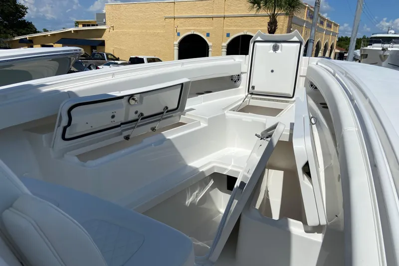 Slide: The Image of 2026 Regulator 31 boat interior with open storage compartments, showcasing sleek design and functionality. - 33