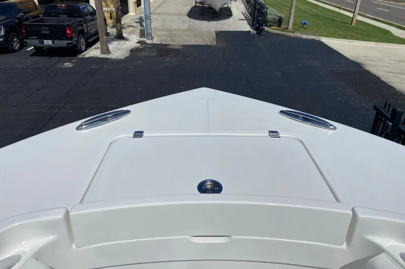 Slide: The Image of Bow view of 2026 Regulator 31 boat, showcasing sleek design and spacious deck. - 39