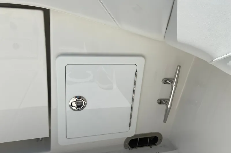 Slide: The Image of Compartment and cleat on 2026 Regulator 31 boat interior. - 6