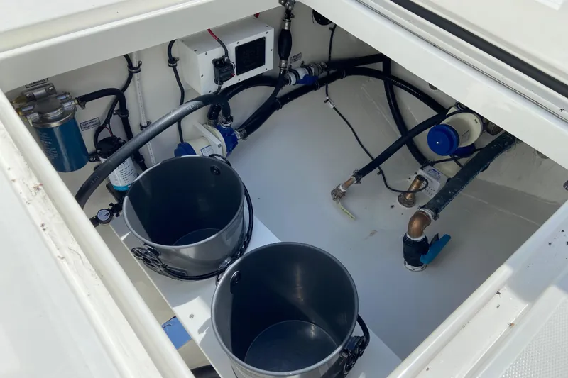 Slide: The Image of 2026 Regulator 31 boat compartment with plumbing and equipment. - 9
