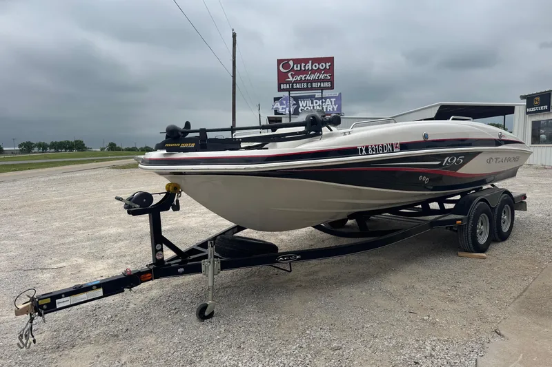 Slide: The Image of 2015 Tahoe 195 boat on trailer at Outdoor Specialties dealership. - 3
