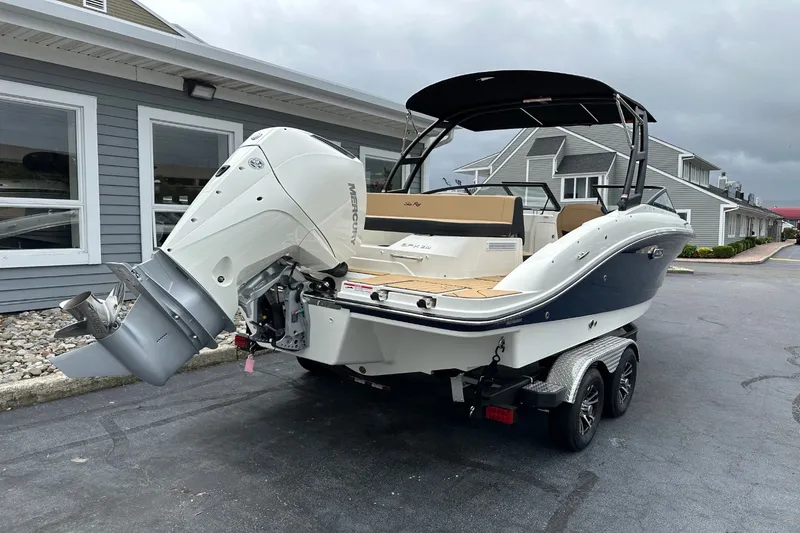 Slide: The Image of 2027 Sea Ray SPX 210 Outboard on a trailer, featuring a large outboard motor. - 5
