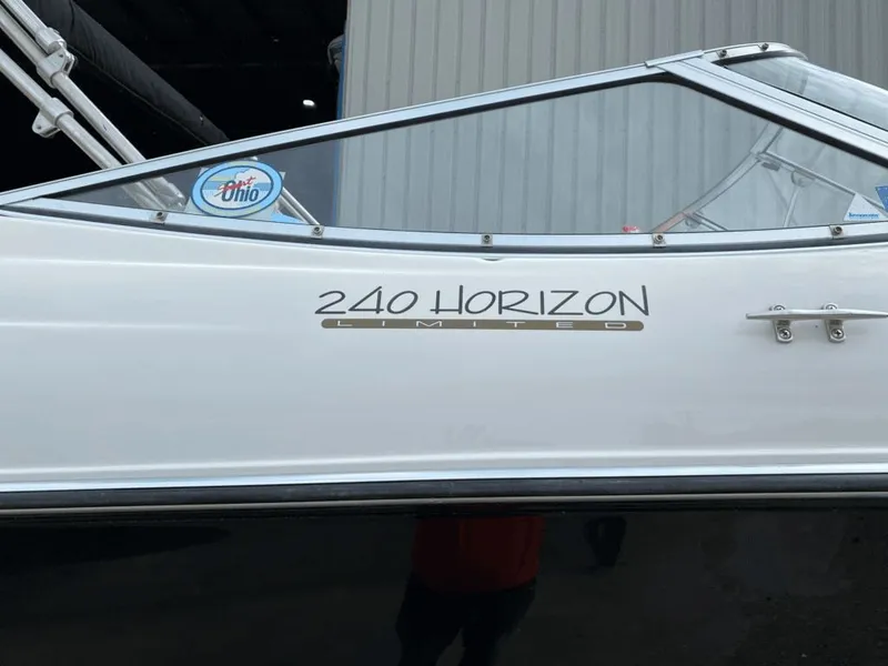 Slide: The Image of 1998 Four Winns 240 Horizon boat with Ohio sticker. - 12