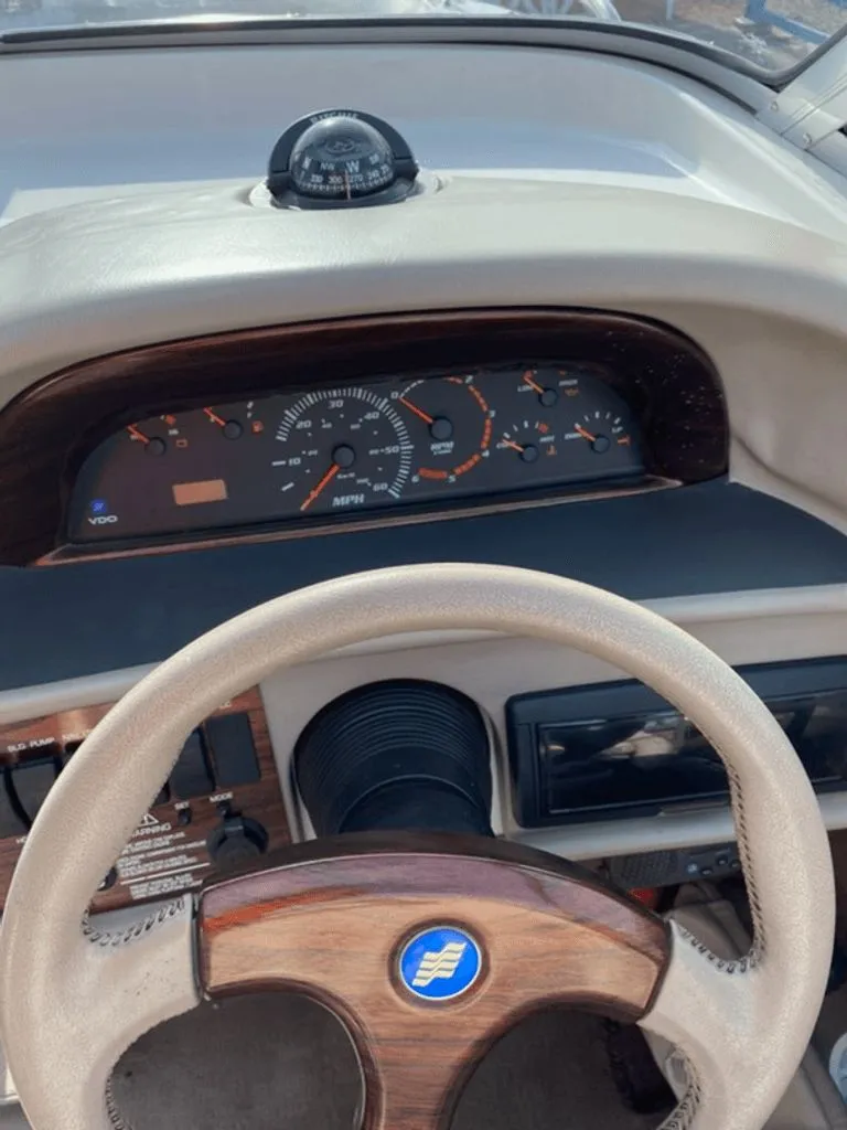 Slide: The Image of Dashboard of a 1998 Four Winns 240 Horizon boat. - 4