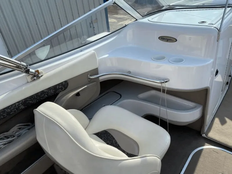 Slide: The Image of Interior of a 1998 Four Winns 240 Horizon boat. - 6