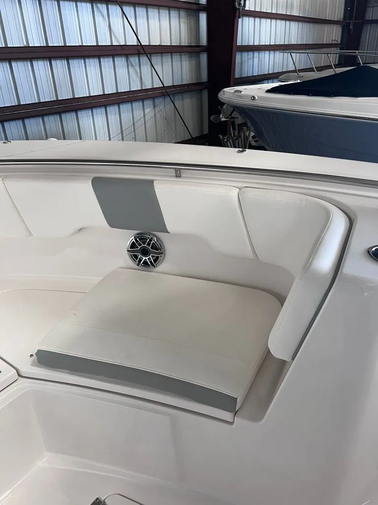 Slide: The Image of Interior view of 2023 Robalo R302 Center Console boat. - 8
