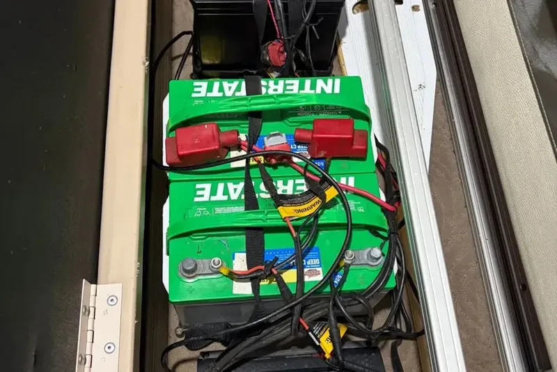 Slide: The Image of Battery setup in a 2014 Sun Tracker Bass Buggy boat. - 15