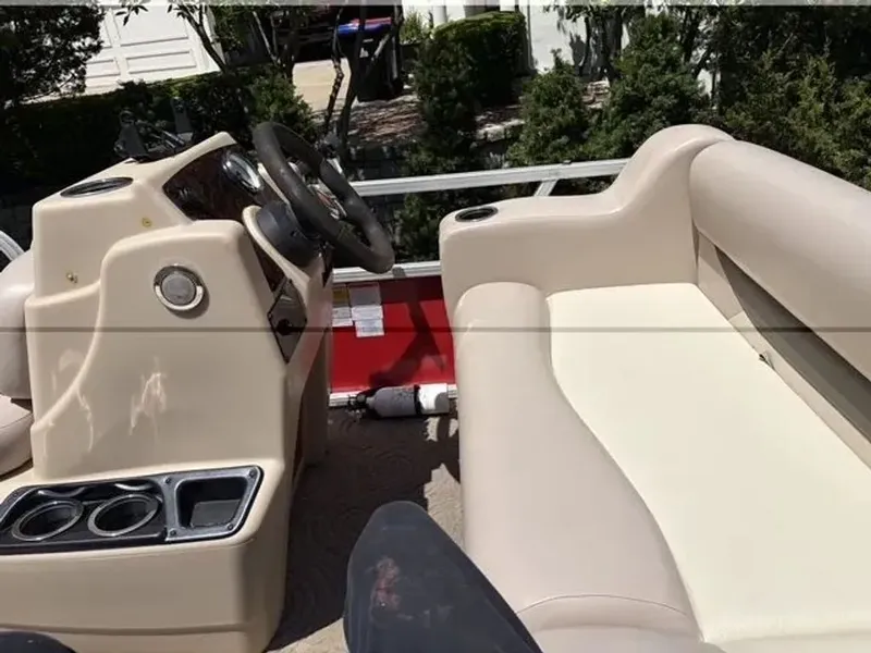 Slide: The Image of Interior of a 2014 Sun Tracker Bass Buggy pontoon boat. - 4