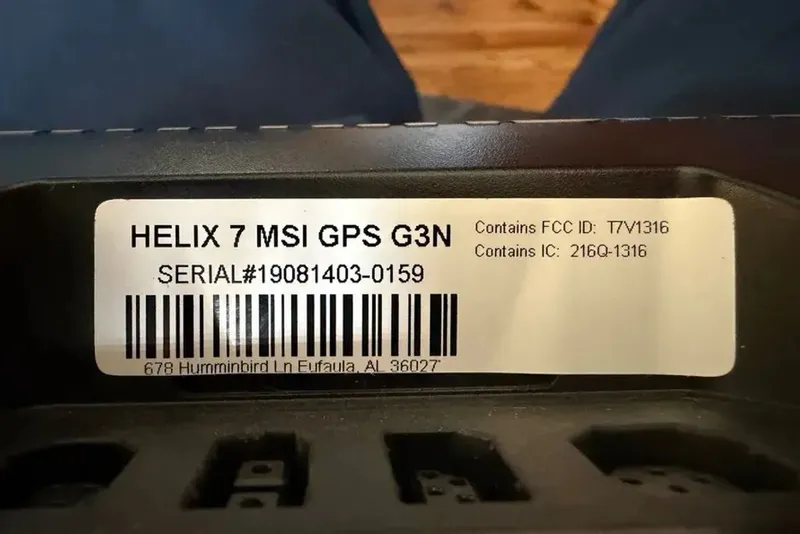 Slide: The Image of Helix 7 MSI GPS G3N serial number and barcode on Sun Tracker boat. - 7