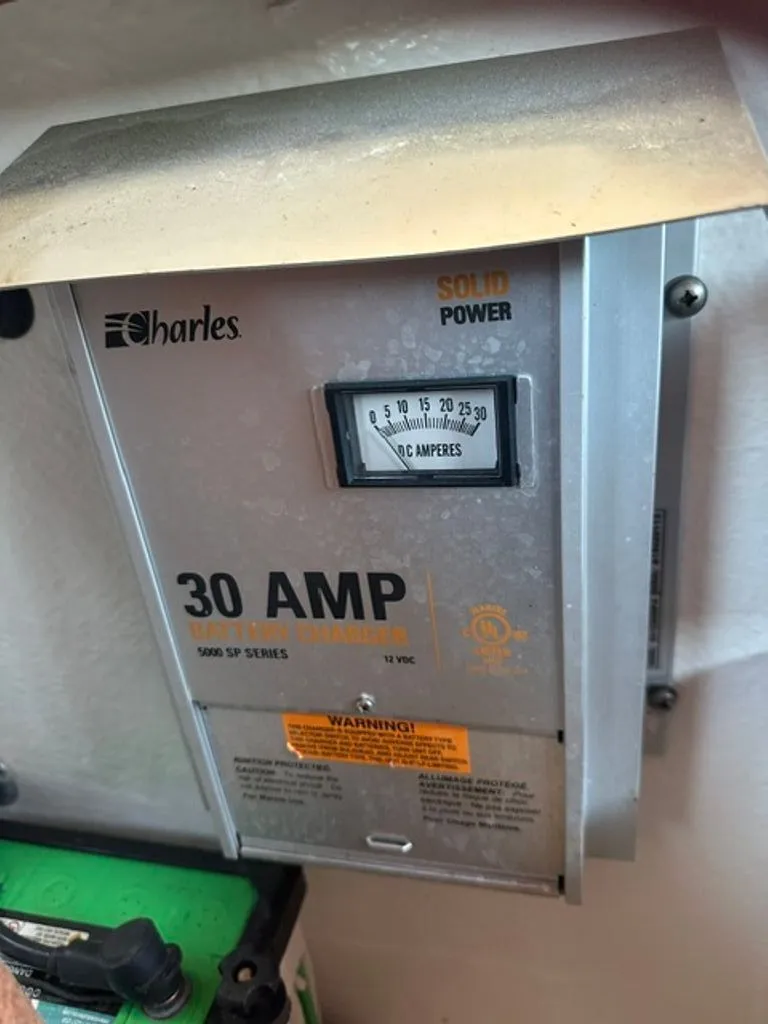 Slide: The Image of 30 Amp battery charger with ammeter, model 5000 SP Series. - 22