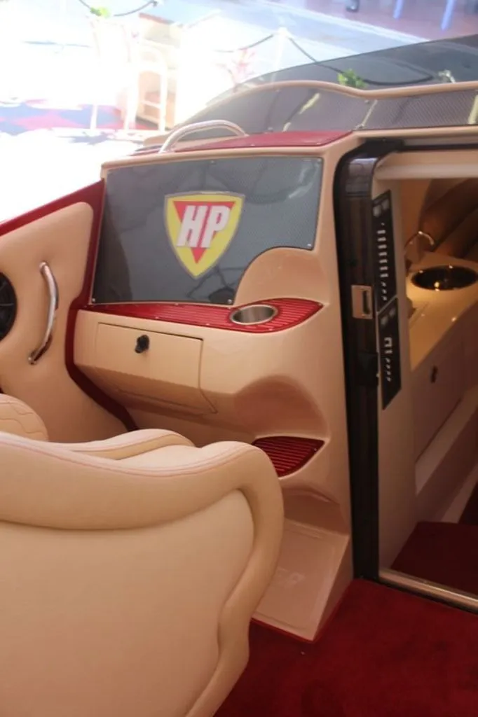 Slide: The Image of Interior of a 2016 Hustler Slingshot with luxurious design. - 3