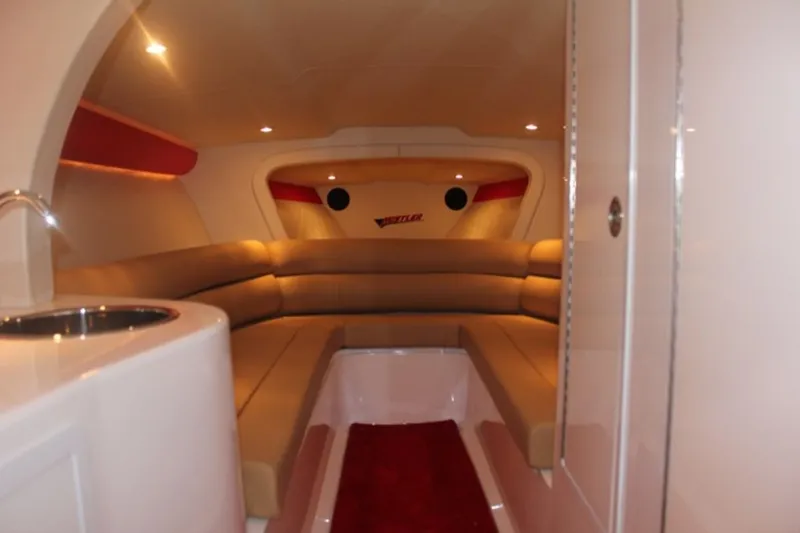 Slide: The Image of Interior of 2016 Hustler Slingshot with luxurious seating. - 9