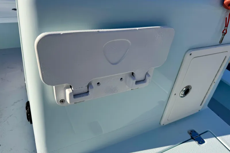 Slide: The Image of Close-up of Waterman Wildwater 23 boat's storage compartment, 2023 model. - 15