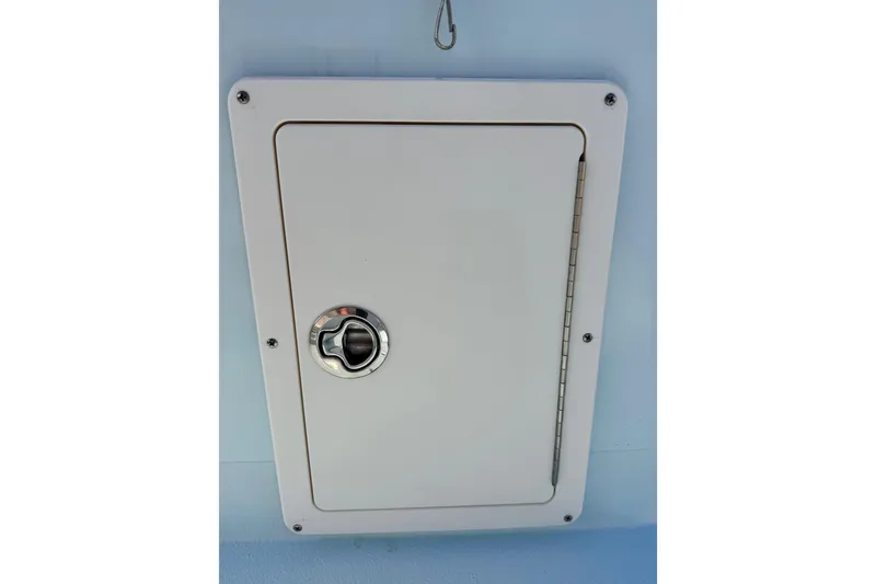 Slide: The Image of Hatch door on Waterman Wildwater 23 boat, 2023 model, with secure latch. - 17