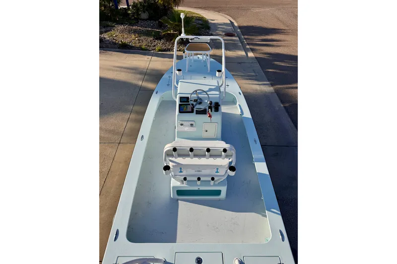 Slide: The Image of 2023 Waterman Wildwater 23 boat, top view, showcasing sleek design and spacious deck. - 45