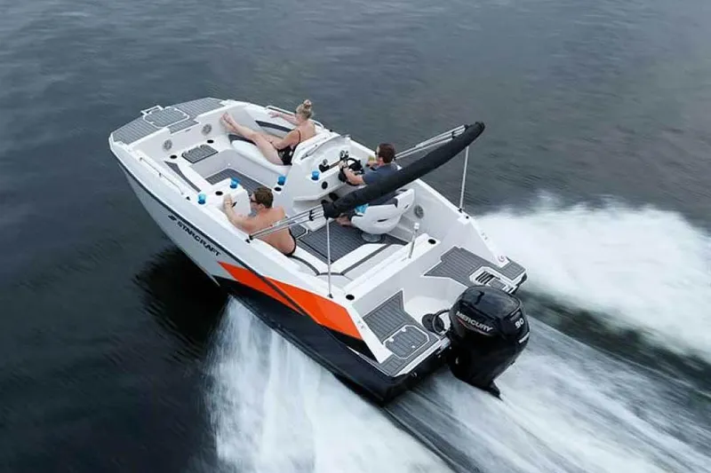 Slide: The Image of Manufacturer Provided Image: 2022 Starcraft SVX 171 OB boat cruising on water with passengers. - 4