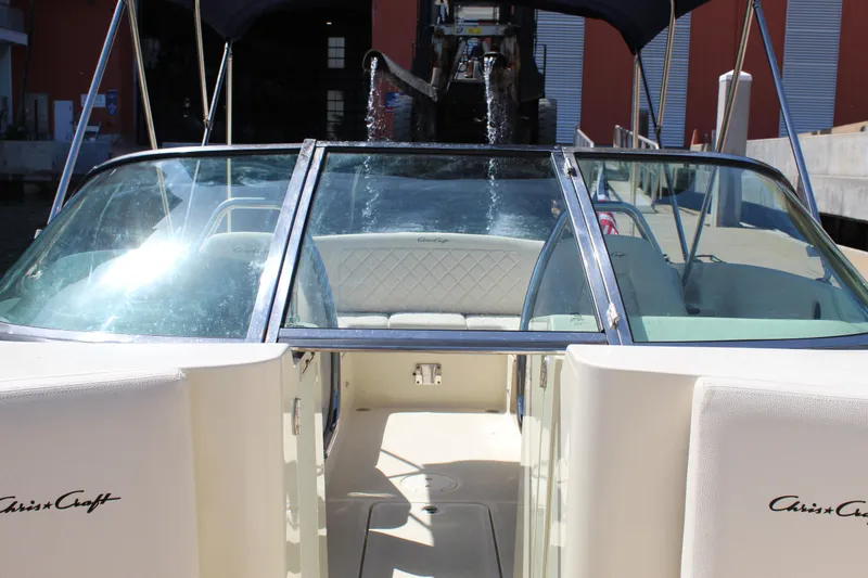 Slide: The Image of 2022 Chris-Craft Launch 27 boat interior with open cockpit and seating. - 16