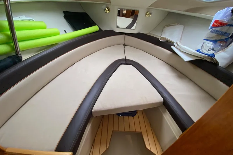Slide: The Image of Interior cabin of a 2016 Cutwater C-24 boat with cushioned seating. - 17