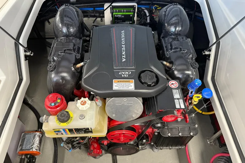 Slide: The Image of Engine compartment of 2025 Crownline Eclipse E235 with Volvo Penta 280 V6 engine. - 14
