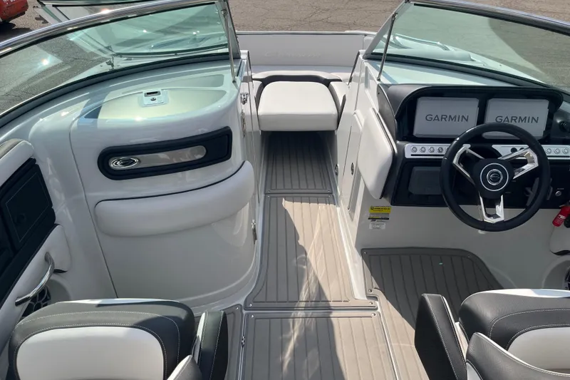 Slide: The Image of Interior view of 2025 Crownline Eclipse E235 boat with Garmin navigation system. - 17