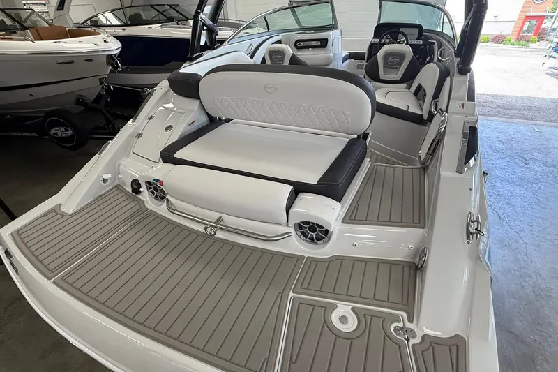 Slide: The Image of 2025 Crownline Eclipse E235 boat interior with sleek seating and modern design. - 3