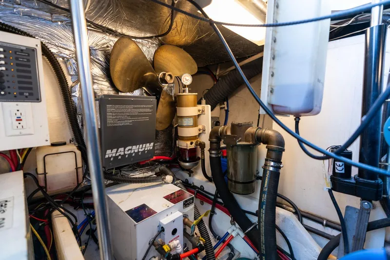 Slide: The Image of Engine room of a 1998 Tiara Yachts 3500 Express with Magnum Energy equipment. - 76