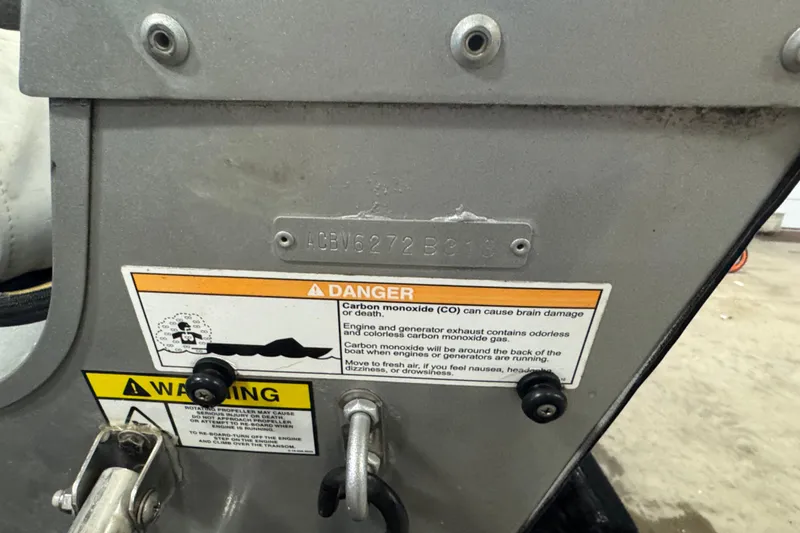 Slide: The Image of 2013 Alumacraft Competitor 175 Sport boat warning labels and serial number plate. - 5