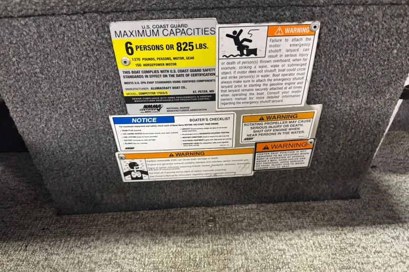 Slide: The Image of 2013 Alumacraft Competitor 175 Sport capacity and safety warning labels. - 8