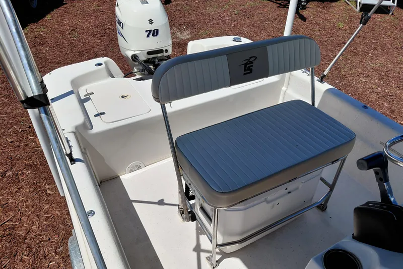 Slide: The Image of 2017 Carolina Skiff 18 JVX CC boat interior with Suzuki 70 outboard motor. - 18