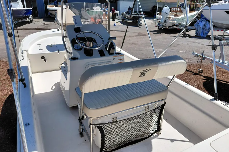 Slide: The Image of 2017 Carolina Skiff 18 JVX CC boat interior with steering console and seating. - 22