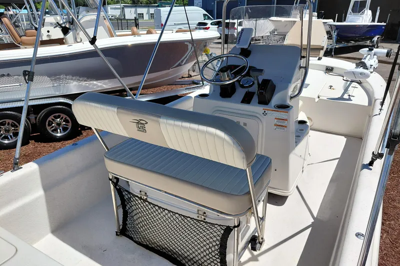 Slide: The Image of 2017 Carolina Skiff 18 JVX CC boat interior with steering console and seating. - 23
