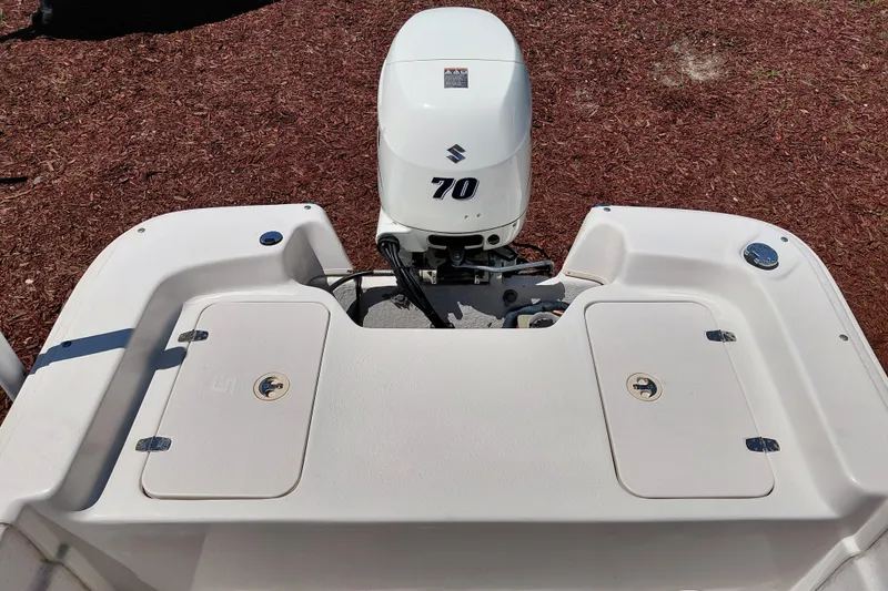 Slide: The Image of 2017 Carolina Skiff 18 JVX CC boat with Suzuki 70 outboard motor. - 24