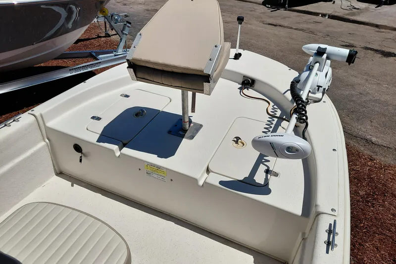 Slide: The Image of 2017 Carolina Skiff 18 JVX CC boat deck with trolling motor and seating. - 28