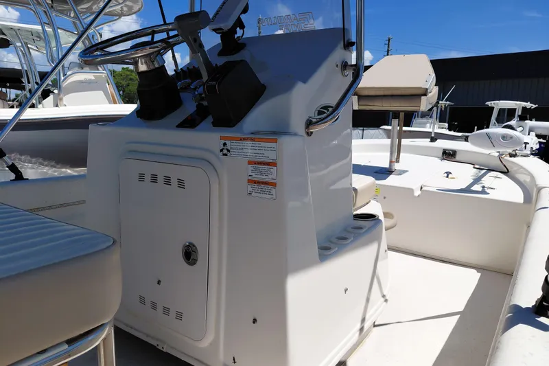 Slide: The Image of 2017 Carolina Skiff 18 JVX CC boat interior with steering console and seating. - 29