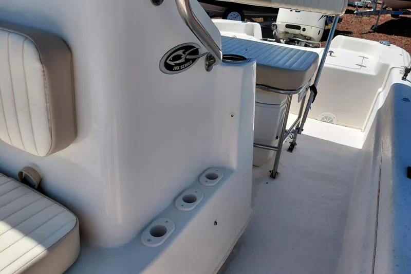 Slide: The Image of 2017 Carolina Skiff 18 JVX CC boat interior with seating and console details. - 32