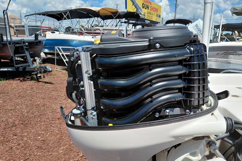 Slide: The Image of 2017 Carolina Skiff 18 JVX CC boat engine detail at outdoor display. - 35