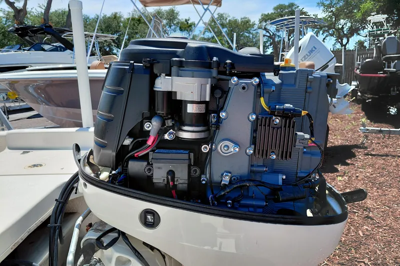 Slide: The Image of 2017 Carolina Skiff 18 JVX CC boat engine, detailed view in outdoor setting. - 36