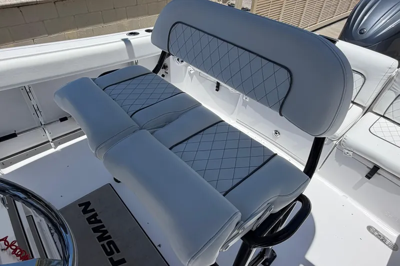 Slide: The Image of 2022 Sportsman Heritage 231 Center Console boat seating with diamond-stitched upholstery. - 12