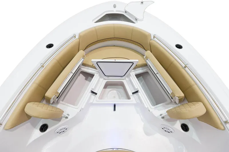 Slide: The Image of Manufacturer Provided Image: 2022 Sportsman Heritage 231 Center Console boat with tan cushioned seating. - 21
