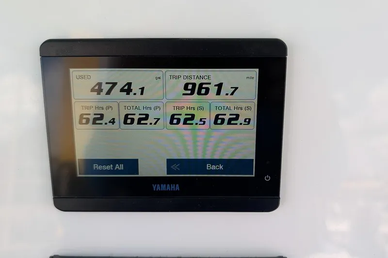 Slide: The Image of Yamaha display showing fuel usage and trip data on 2025 Key West 260 Center Console. - 17