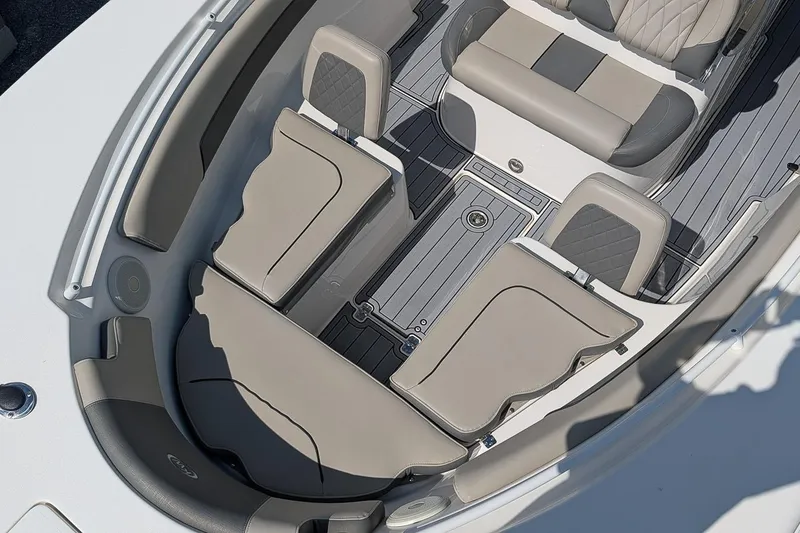 Slide: The Image of 2025 Key West 260 Center Console boat interior with cushioned seating and sleek design. - 21