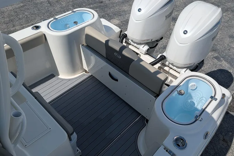 Slide: The Image of 2025 Key West 260 Center Console boat with dual engines and live wells. - 9