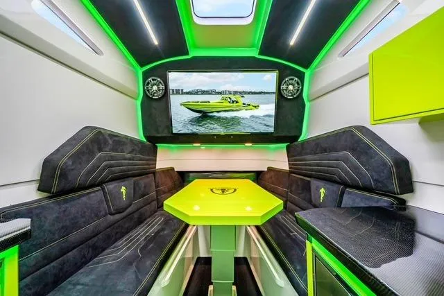Slide: The Image of Luxurious interior of 2026 Statement 47 GTrs boat with neon accents and modern seating. - 3