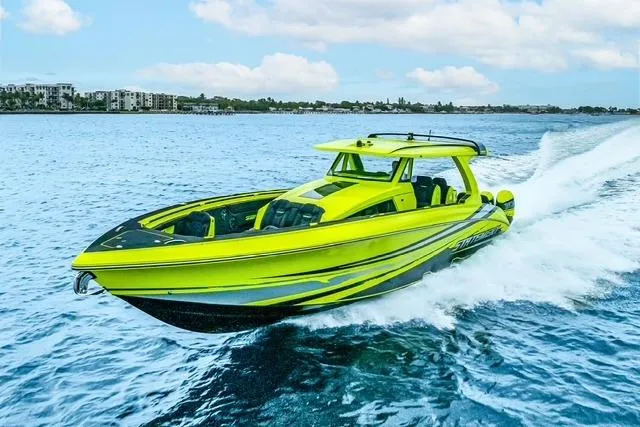 Slide: The Image of Bright green 2026 Statement 47 GTrs speedboat cruising on open water. - 4