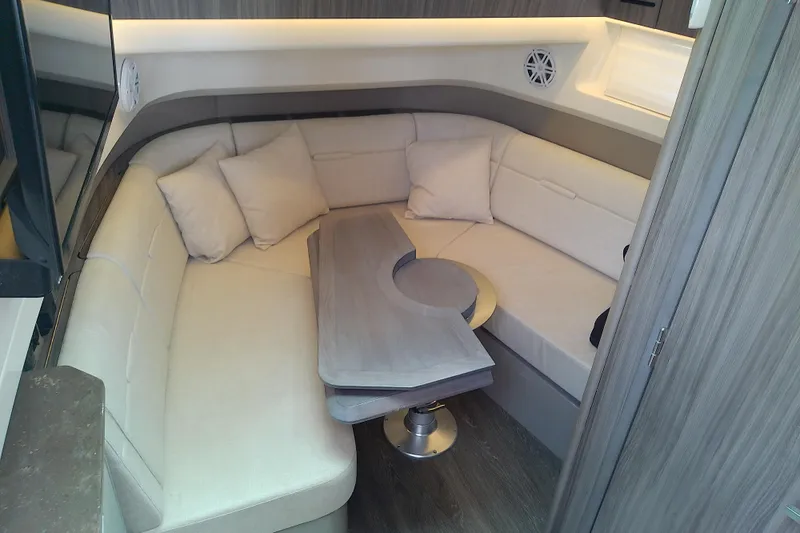 Slide: The Image of Luxurious interior of 2019 Sea Ray SLX 400 Outboard with plush seating and modern design. - 40