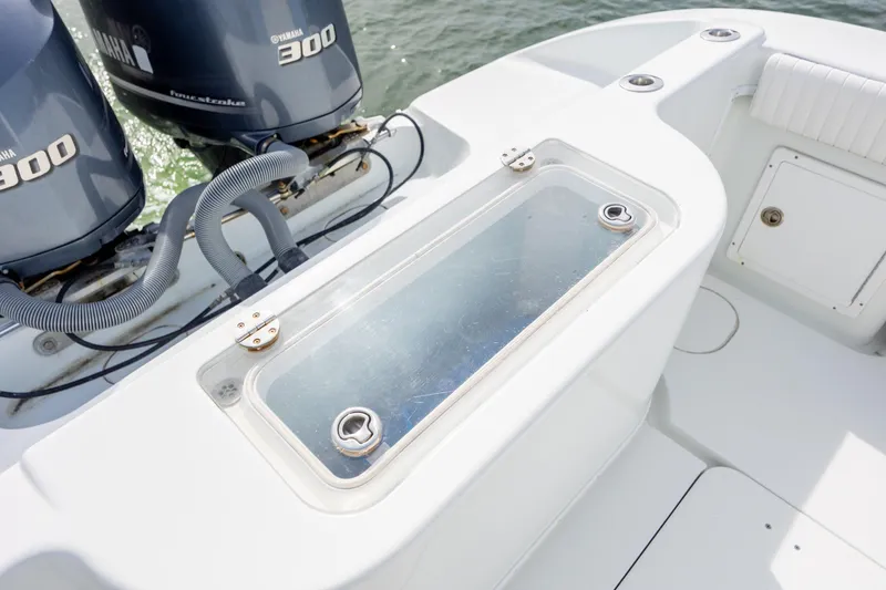 Slide: The Image of 2013 Yellowfin 32 Offshore boat with Yamaha 300 engines, featuring a sleek deck design. - 27